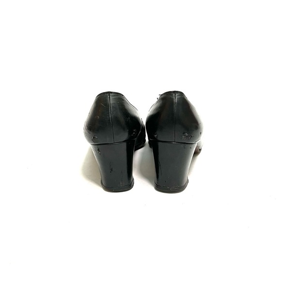 FERRAGAMO | Vintage 1990s black leather logo horsebit heeled loafers